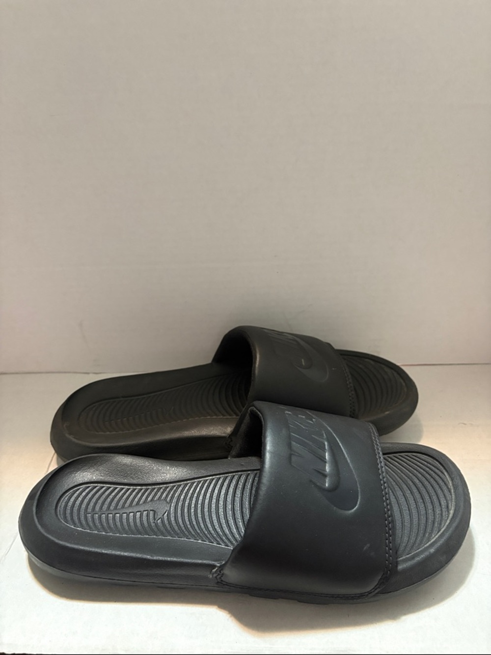 Nike Black Men's Slide Sandals with Embossed Logo